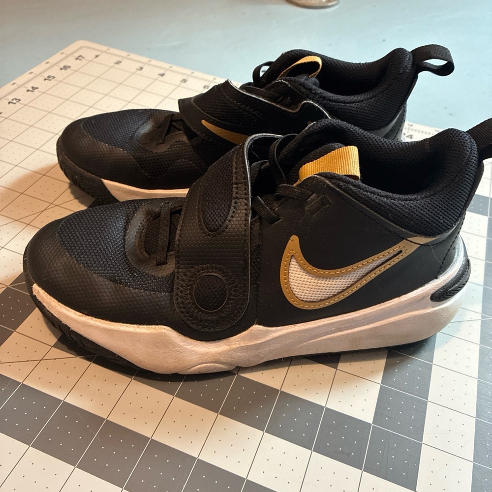 Nike Kids Black and Gold basketball Shoes